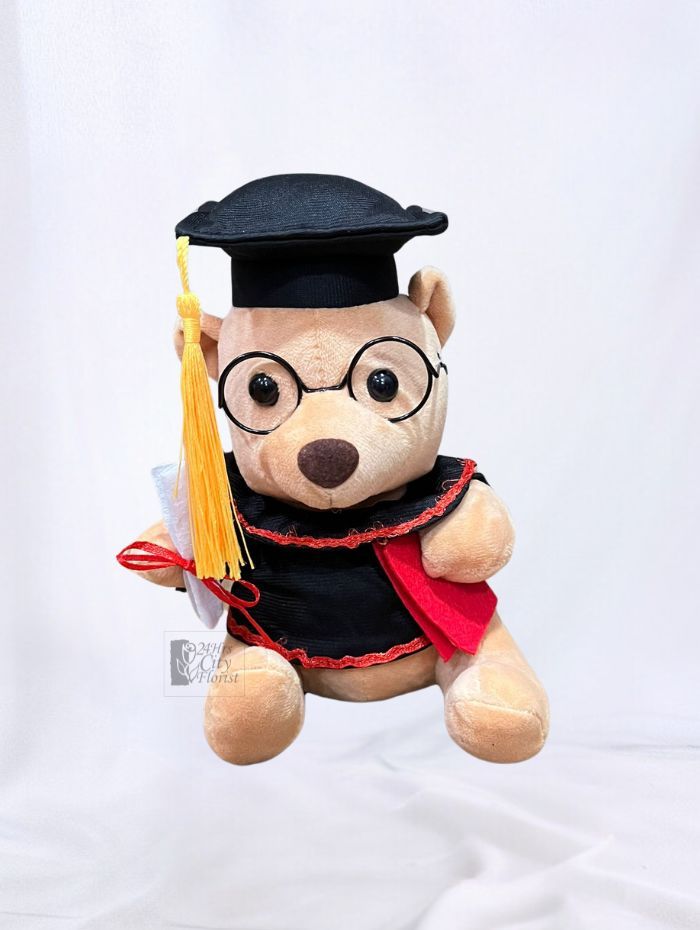 Graduation bear in g..